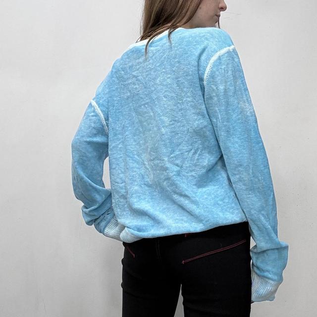 Slouchy oversized distressed knit jumper