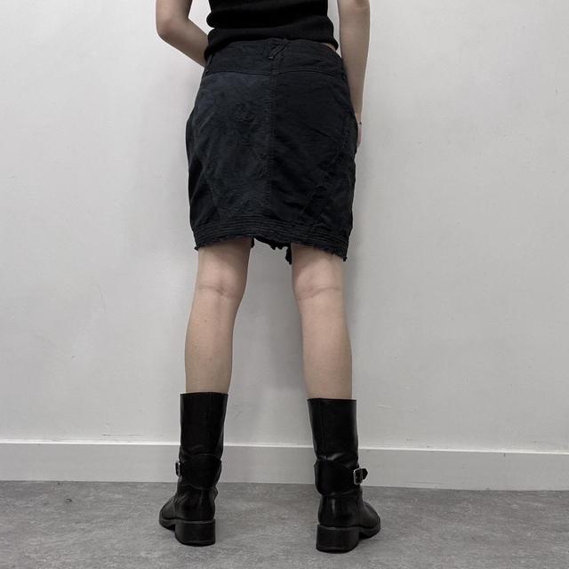 Distressed patchwork asymmetric skirt