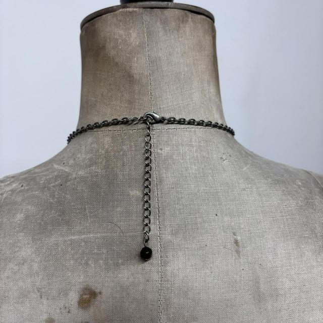 Delicate beaded charm necklace