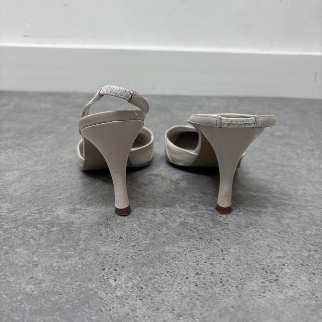 White leather pointed heels