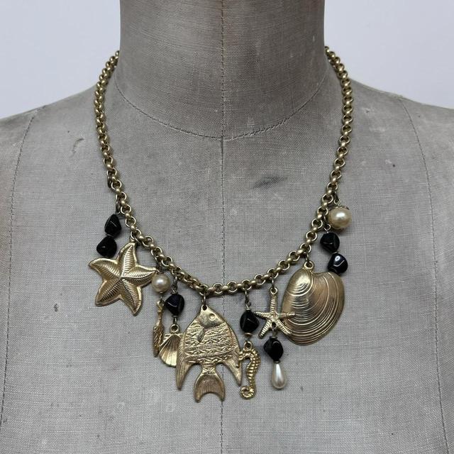 Gold sea shell mermaid charm necklace