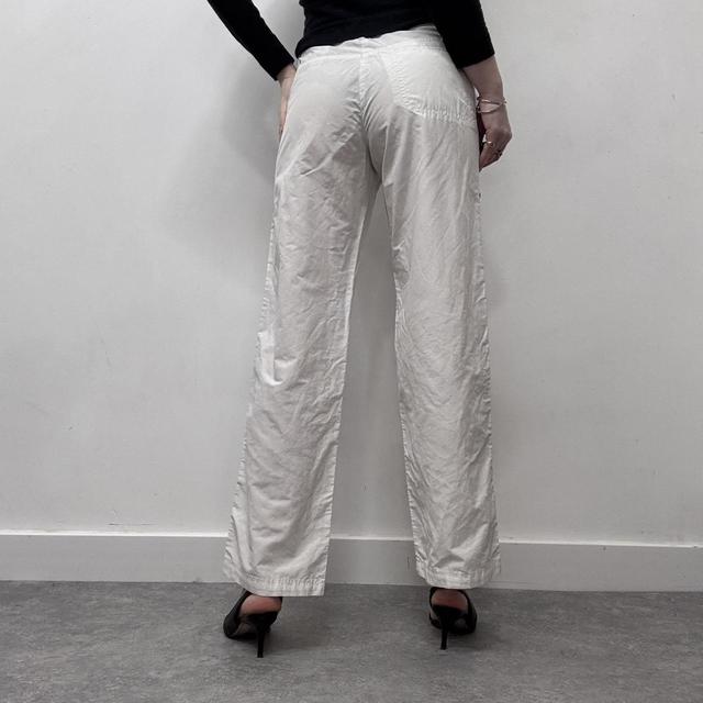 White flared armari trousers