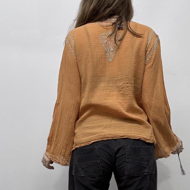 Orange cotton embroidered flared shirt