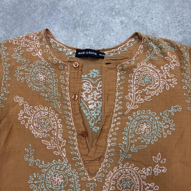 Orange cotton embroidered flared shirt