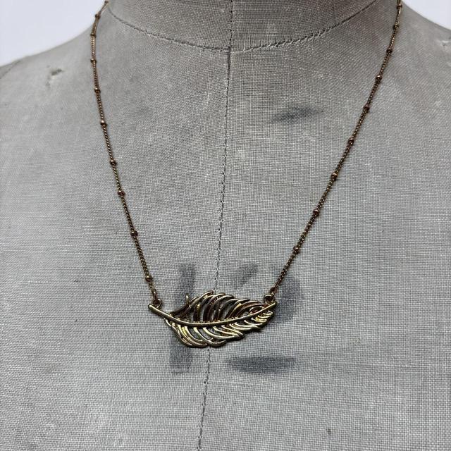 Gold feather hippie pendant