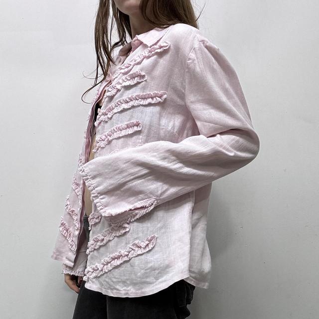 Pink flared distressed ruffle shirt