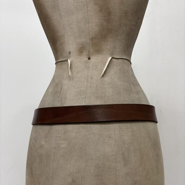 Chunky brown leather belt