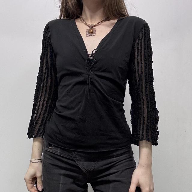 Sheer lace ribbed flared corset top