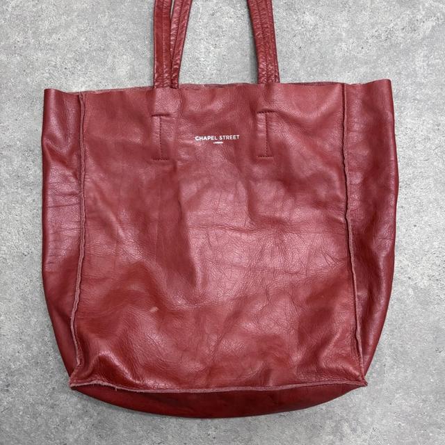 Red leather tote bag