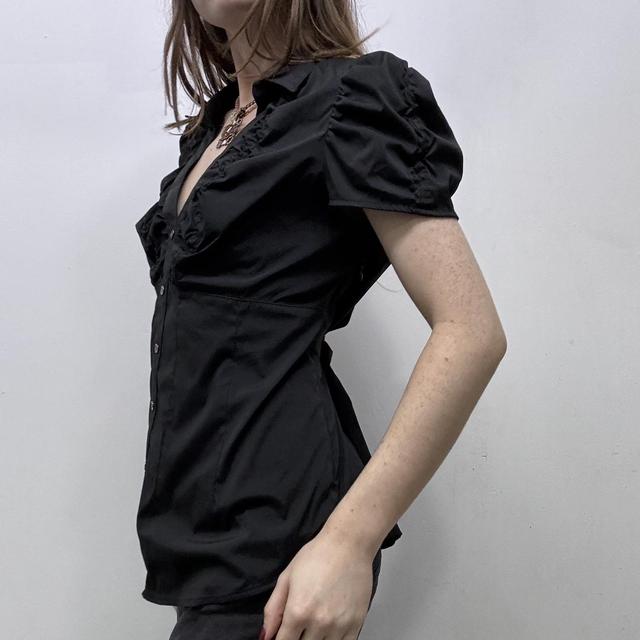 Gathered cinched black puff shirt