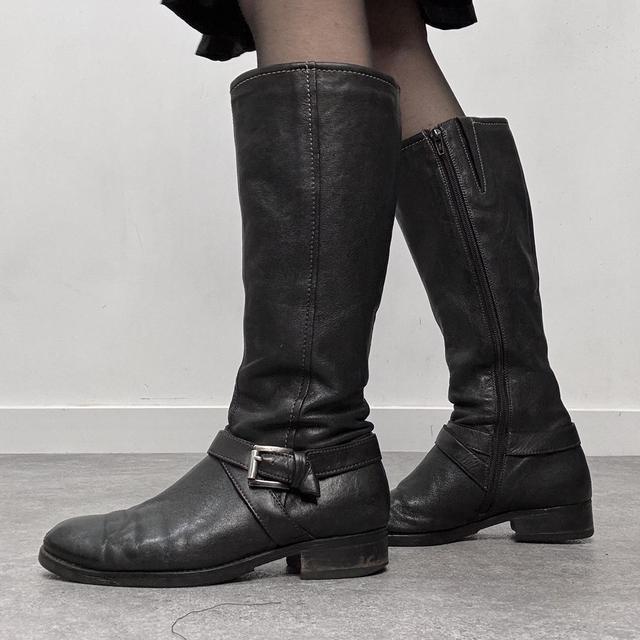 Black buckle riding boots