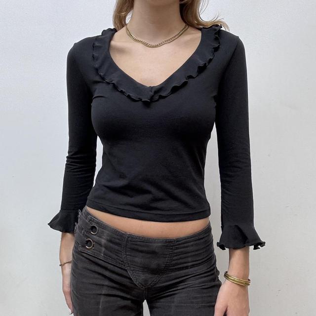 Black flared ruffle top
