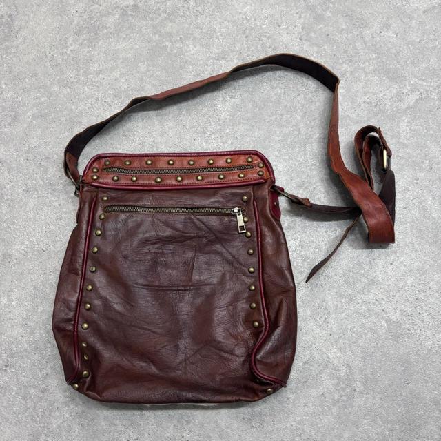 Cow hide studded brown leather bag
