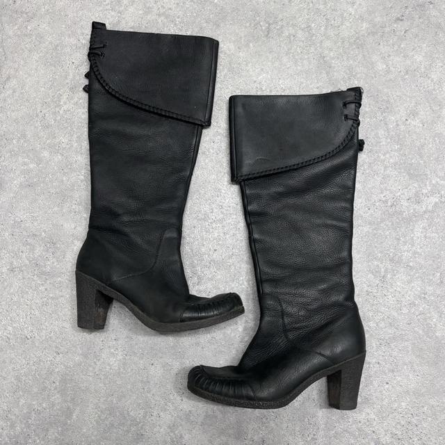 Black square toe leather boots