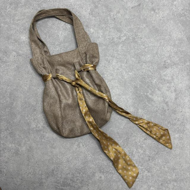 Brown bow shoulder bag