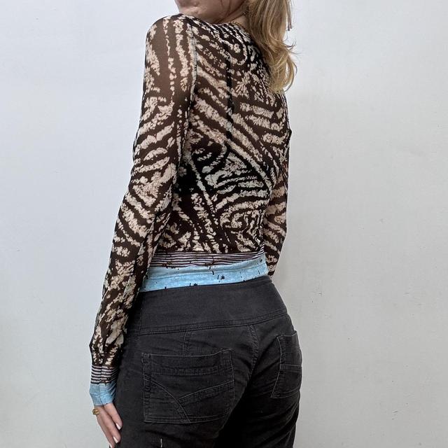 Sheer distressed graphic print mesh top