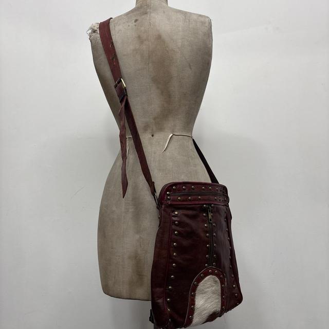 Cow hide studded brown leather bag