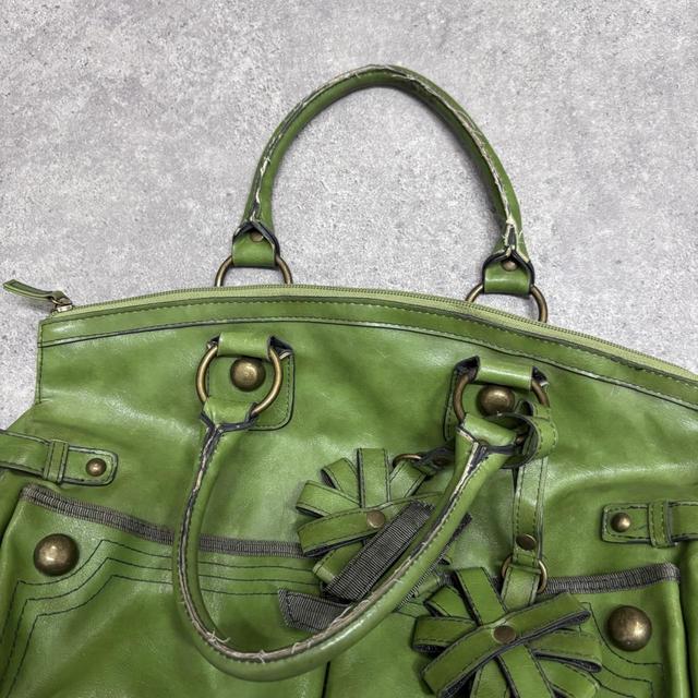Green slouchy leather charm bag