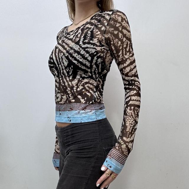 Sheer distressed graphic print mesh top