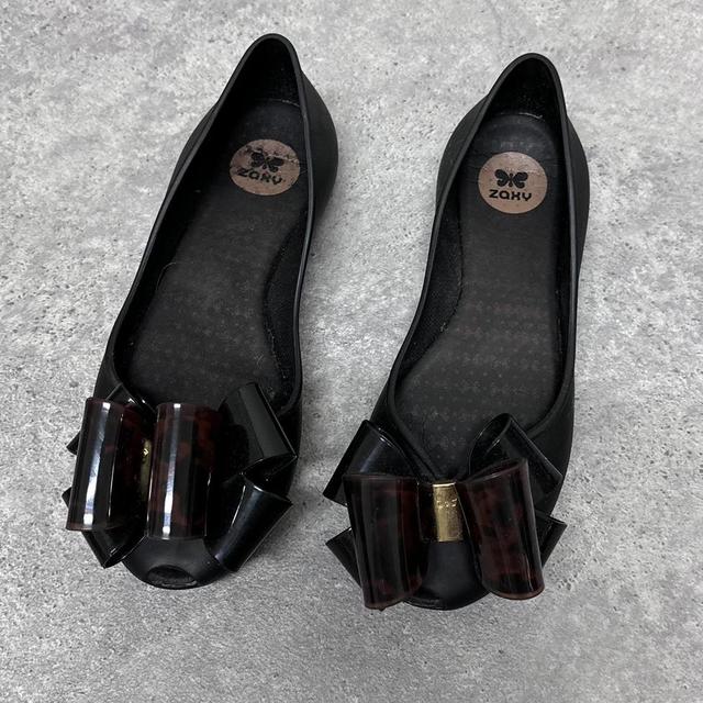 Rubber bow ballet pumps