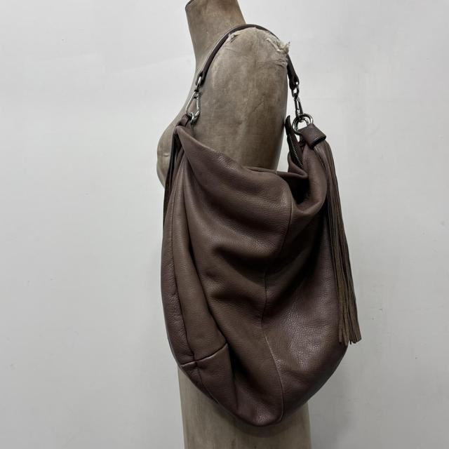 Brown leather slouchy tassel bag