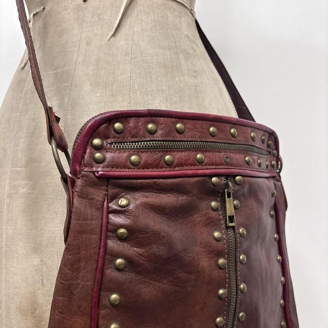 Cow hide studded brown leather bag