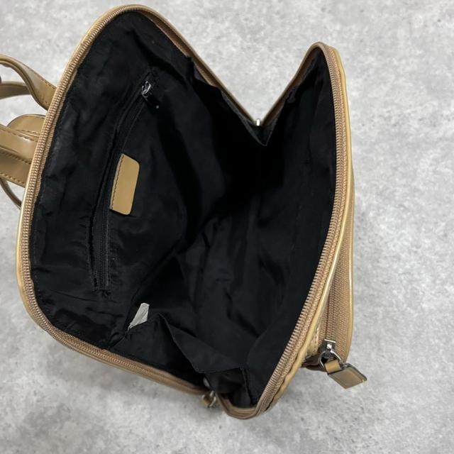 Tan paintent PVC backpack