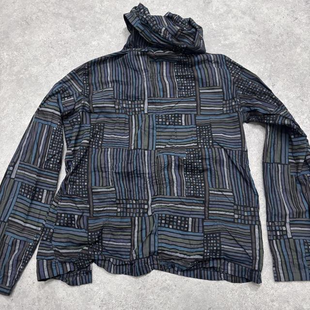 Asymmetric gathered patterned shirt
