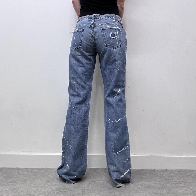 Flared distressed flared painted jeans