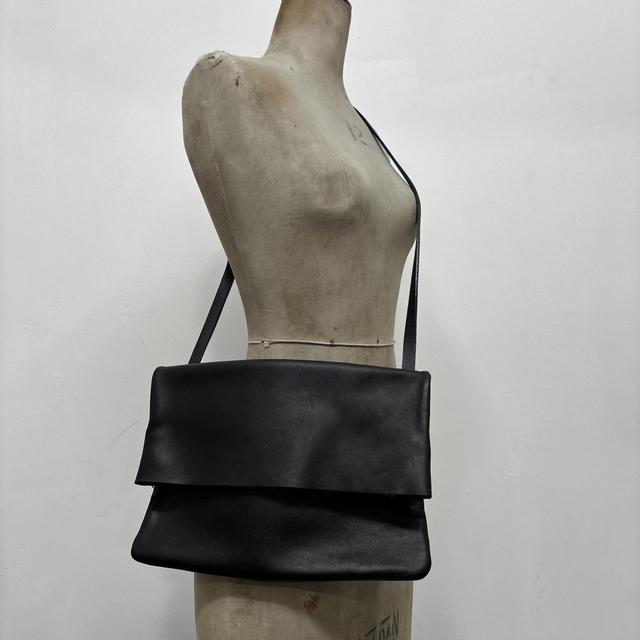 Black leather COS crossbody bag
