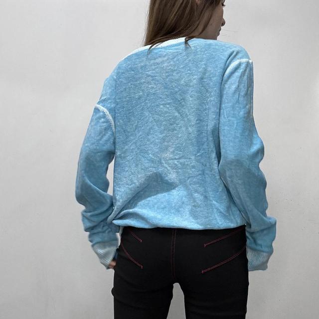Slouchy oversized distressed knit jumper