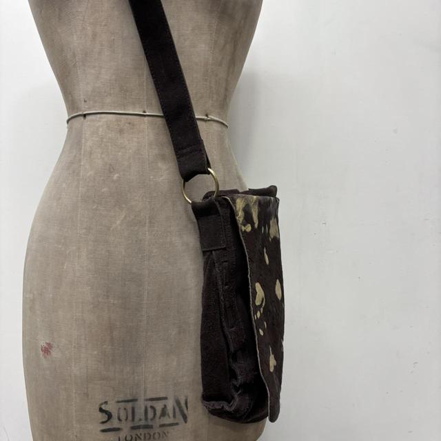 Cow hide abstract gold bag