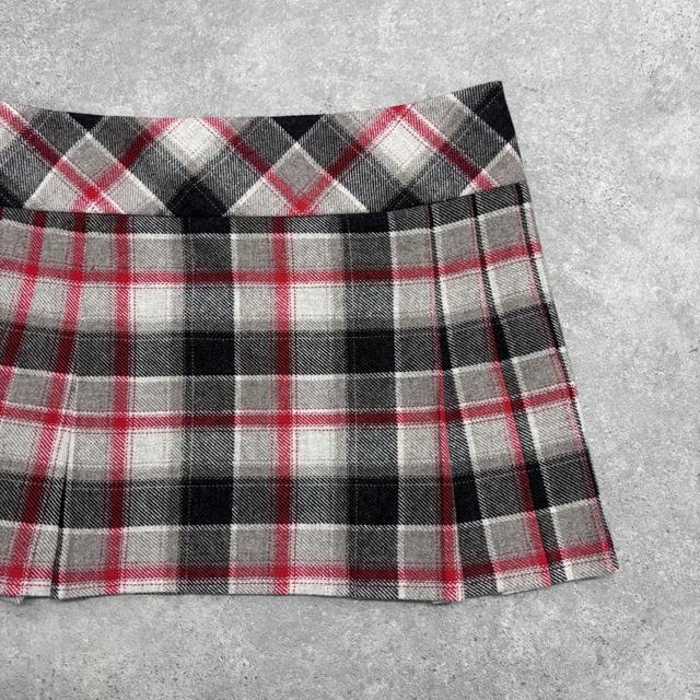 Black and red checked pleated kilt