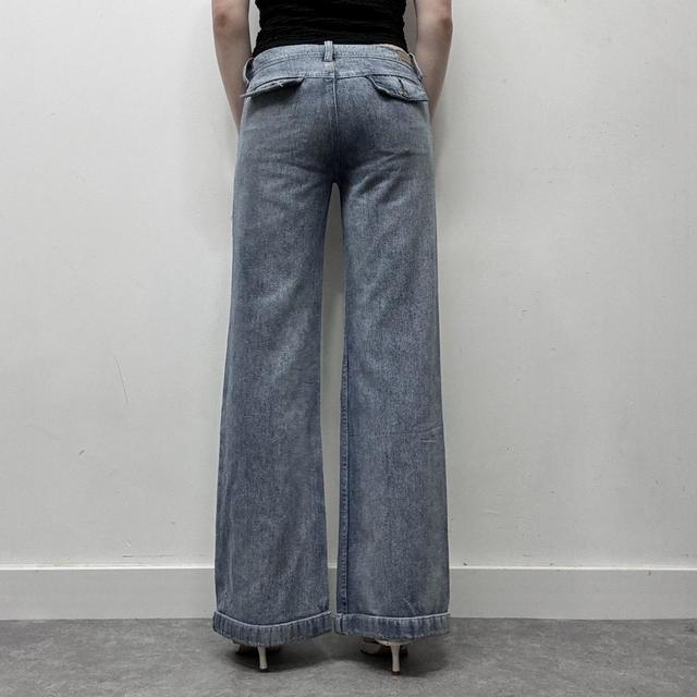 Low rise distressed flared jeans