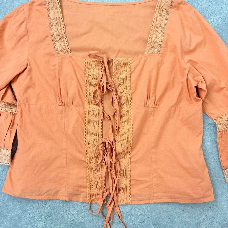 flared orange lace cotton blouse