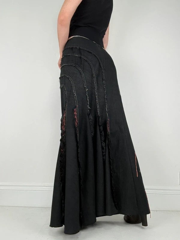 Flared black distressed maxi skirt