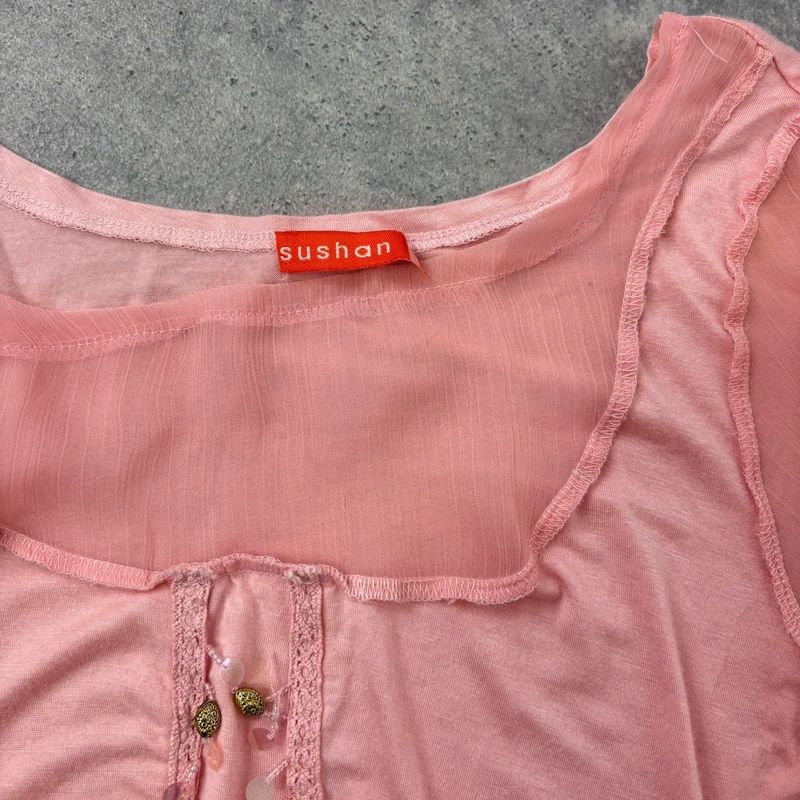 pink flared long sleeve t-shirt