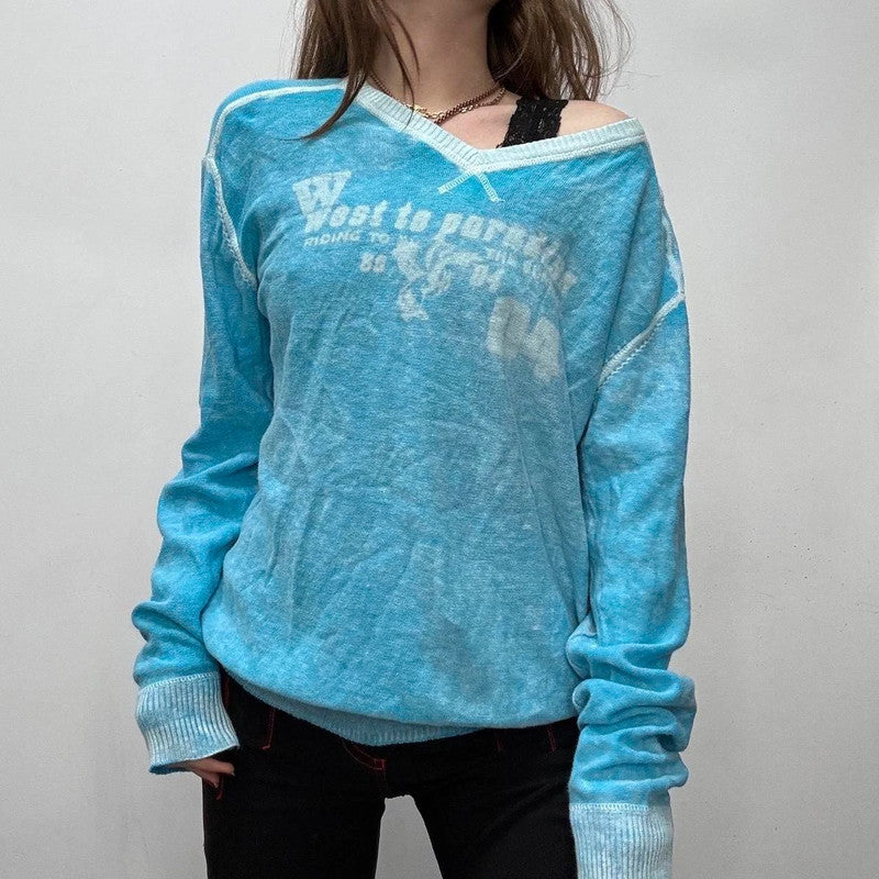 Slouchy oversized distressed knit jumper