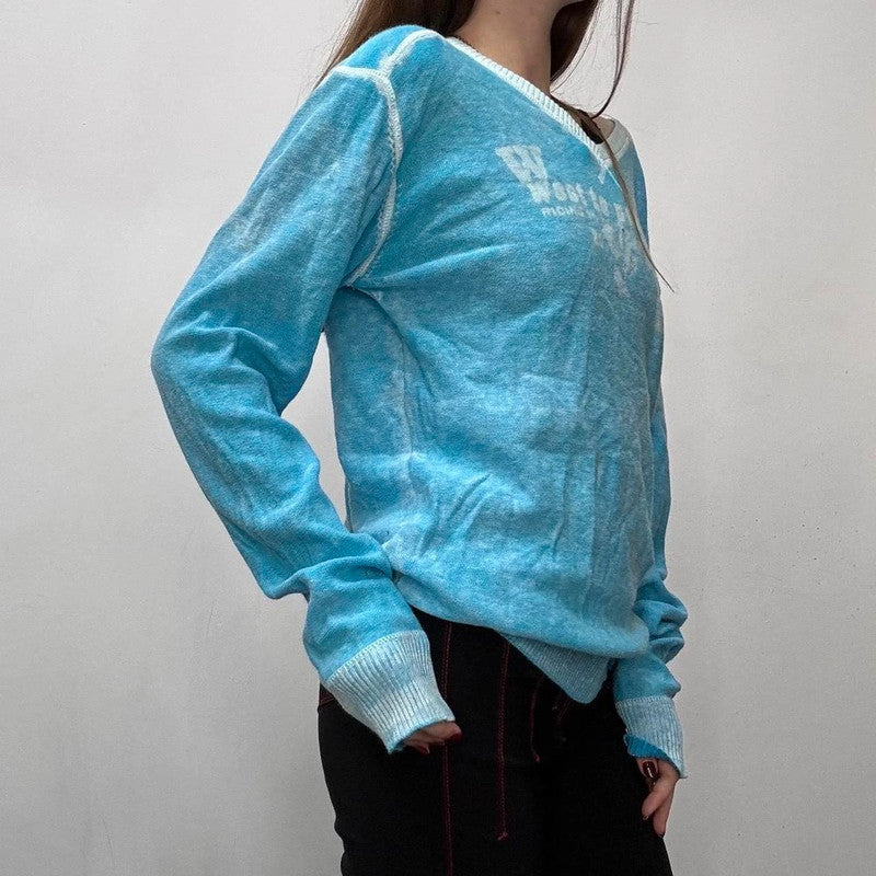 Slouchy oversized distressed knit jumper