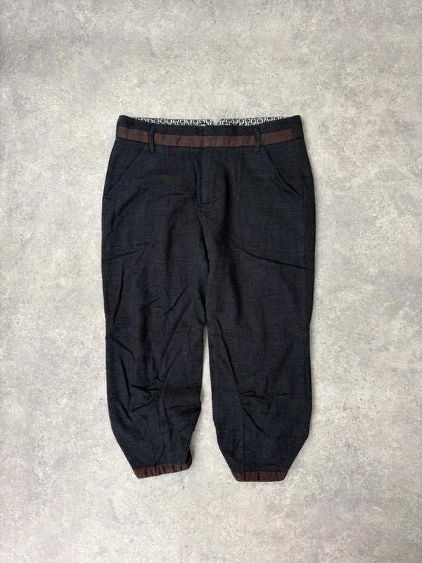 Pleated wool pinstripe capri grunge trousers