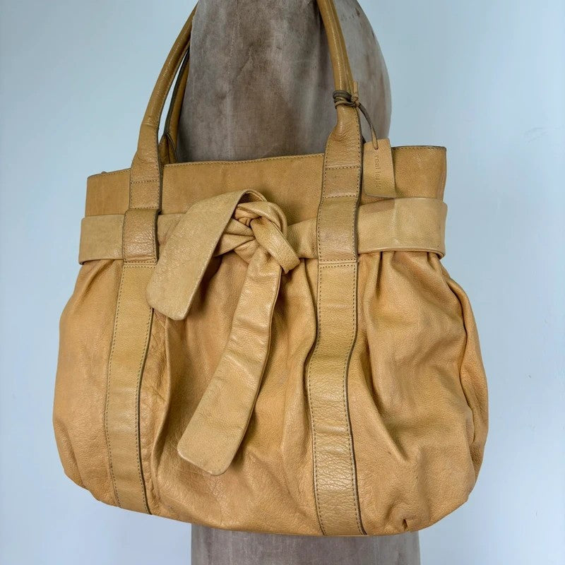 Cream yellow leather knot pleated handbag