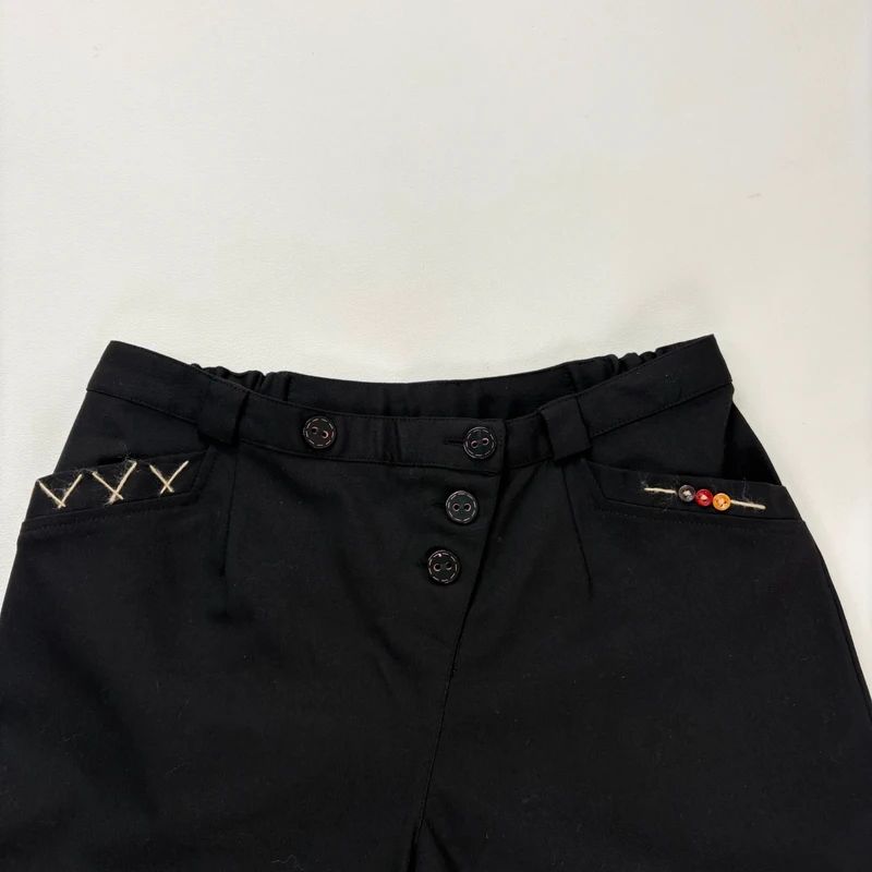 black asymmetric button grunge trousers