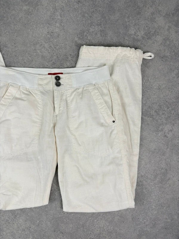 White low rise wide leg flared linen trousers