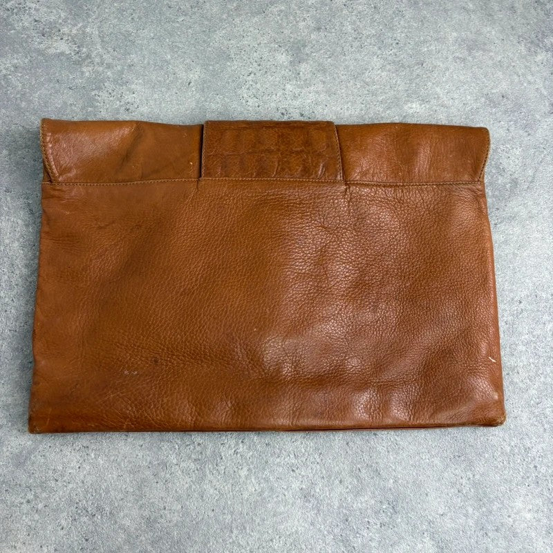 tan lather piercing punky silver hardware clutch bag