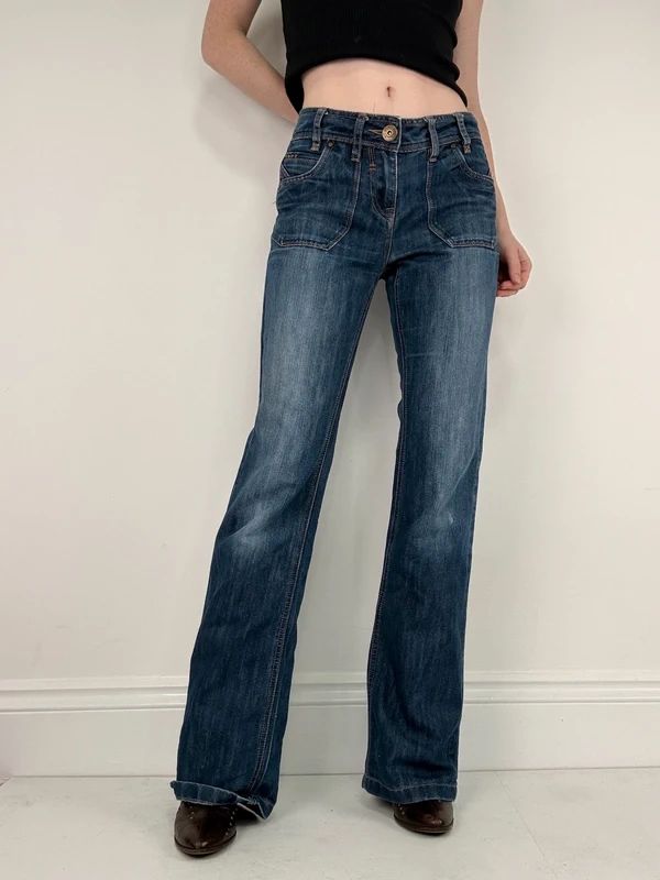 Low rise distressed buckle back Jeans