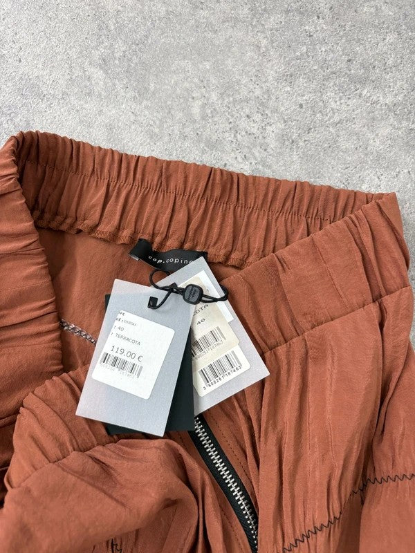 Cop Copine gathered ruched orange midi skirt