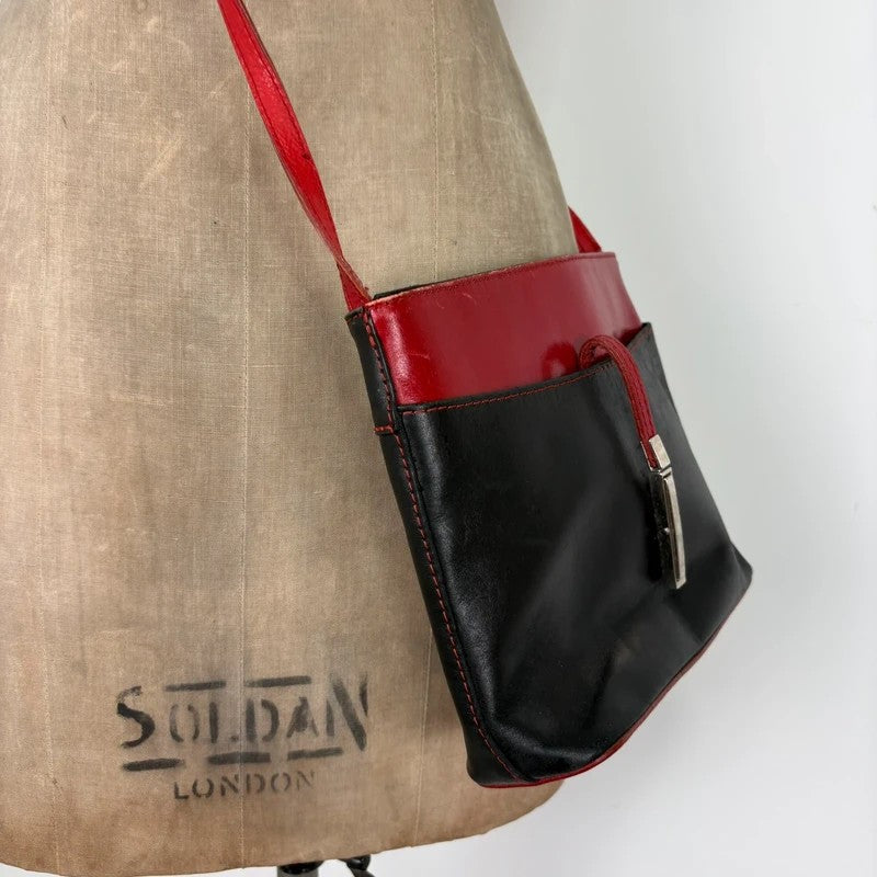 Black and red leather patient mini messenger bag