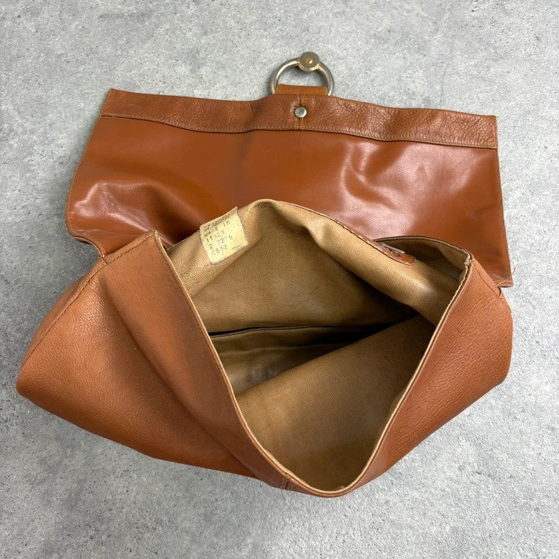 tan lather piercing punky silver hardware clutch bag