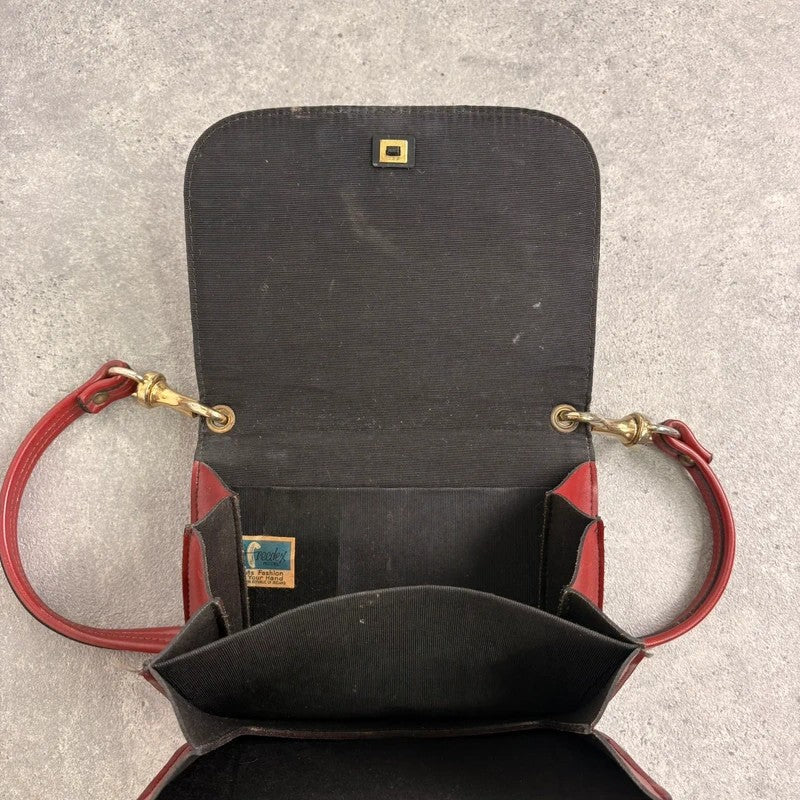 Red leather minimalistic shoulder handbag