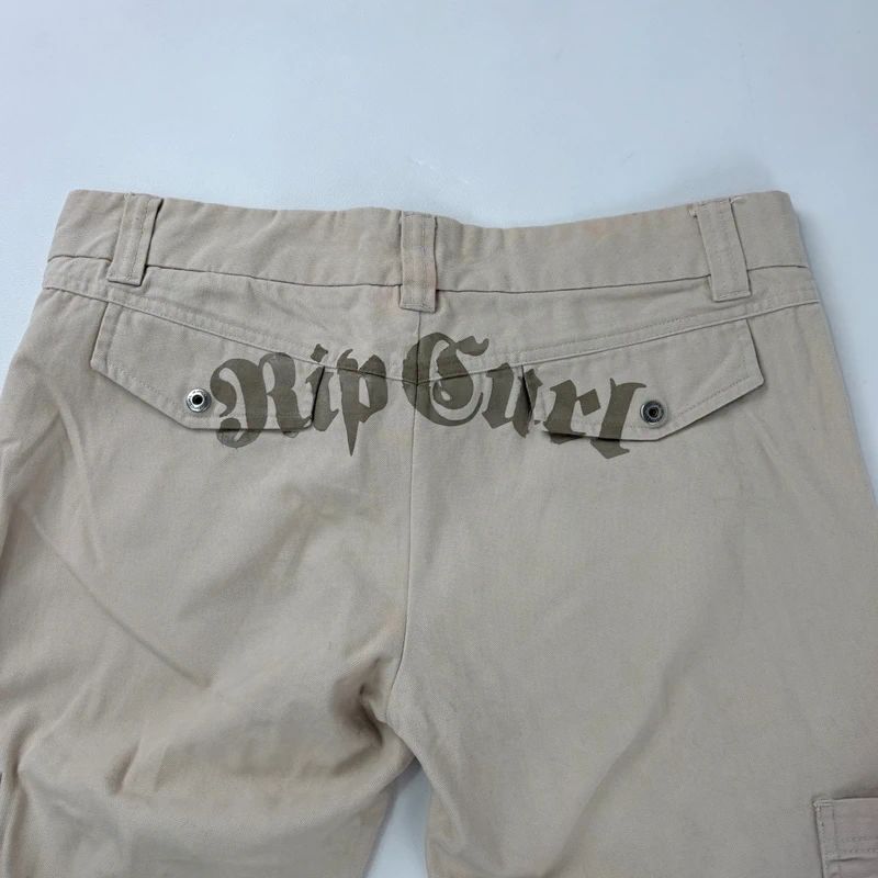 tan canvas wide leg spellout rip curl surfer pants